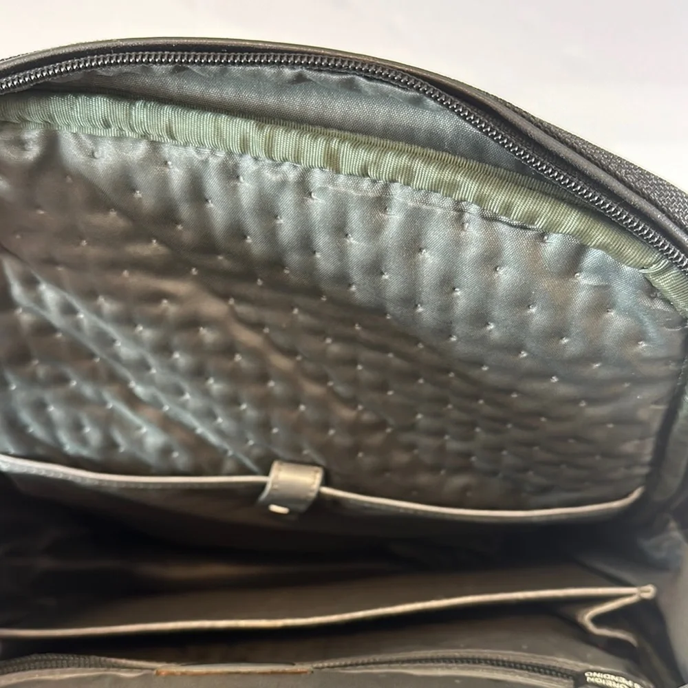 Tumi Black Backpack with Structured Design